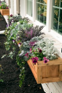 From Fixer Upper, these window boxes were the inspiration for brightening up the barn's exterior